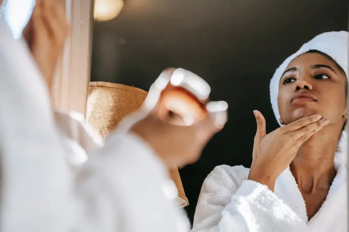 Woman massaging her face